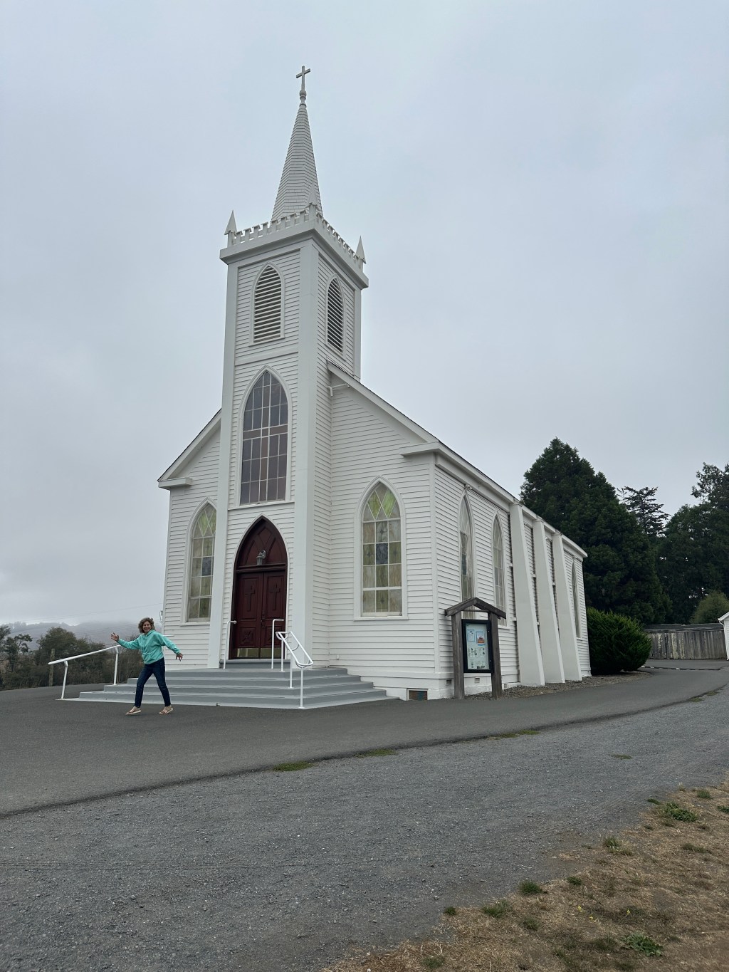 Chris running from the church, fearing those birds. 